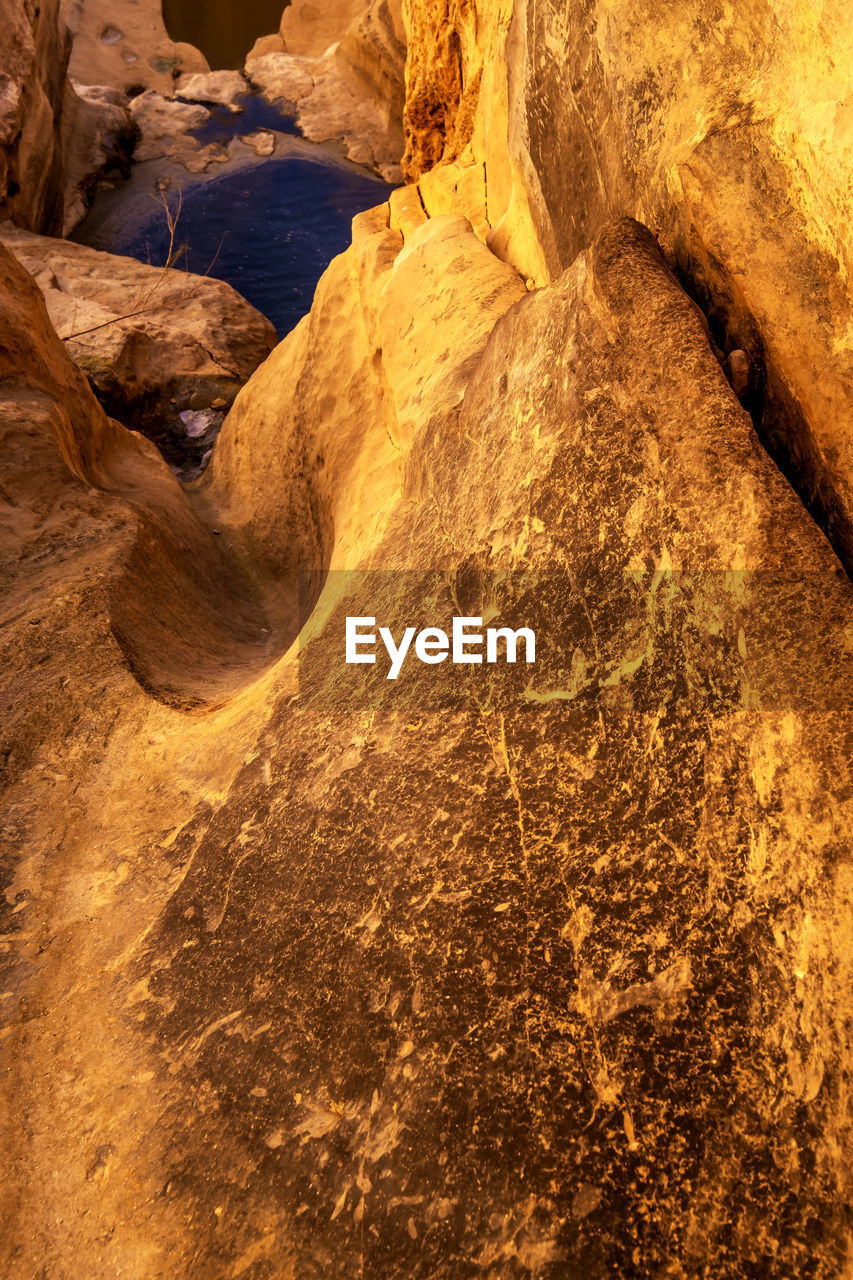 High angle view of rock formation in sea