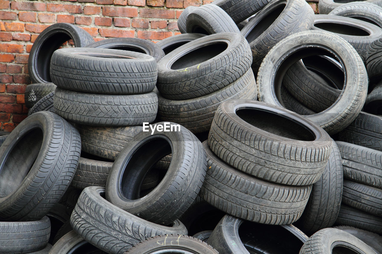 Stack of obsolete tires outdoors