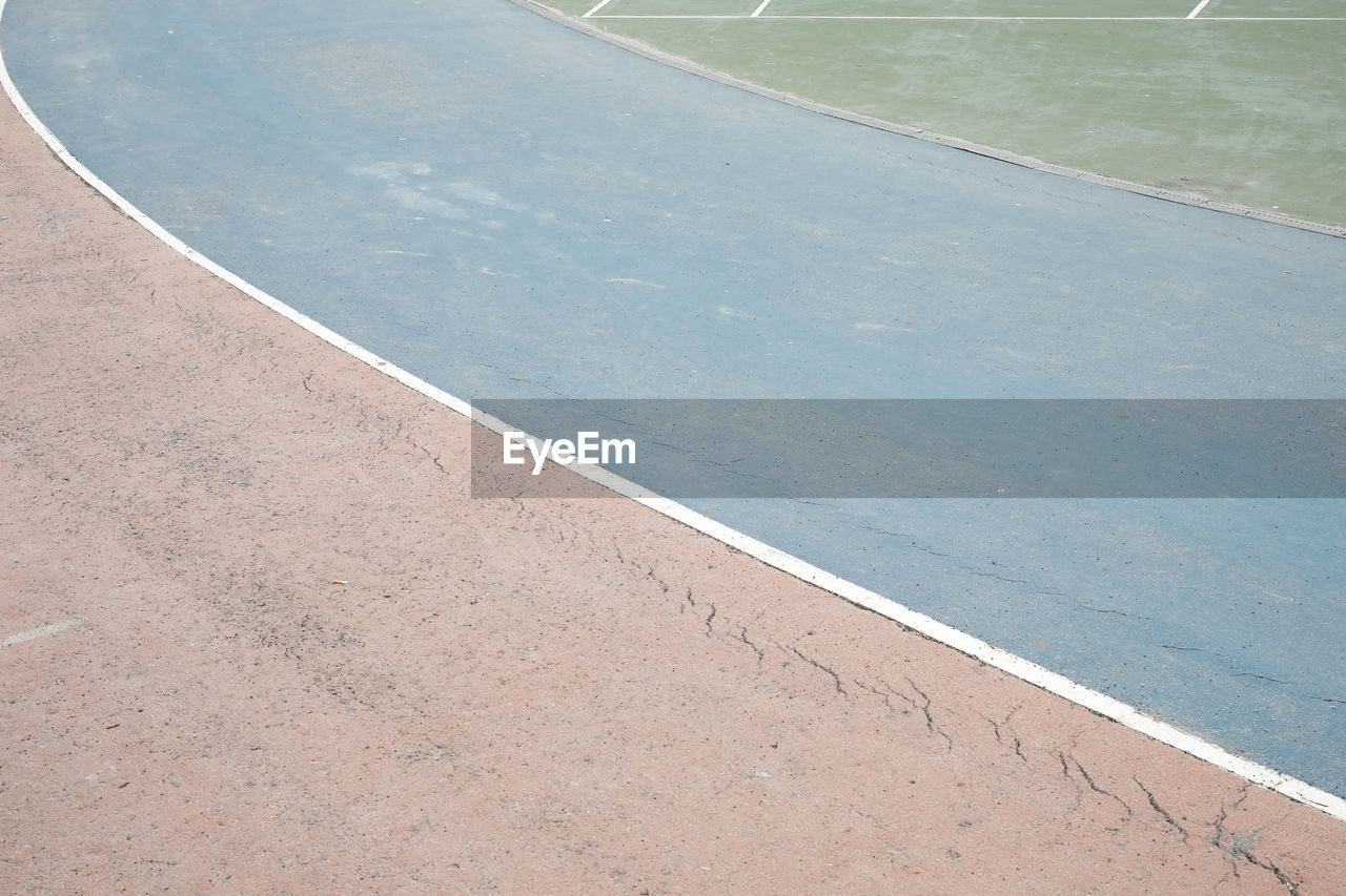 HIGH ANGLE VIEW OF FIELD AND WATER