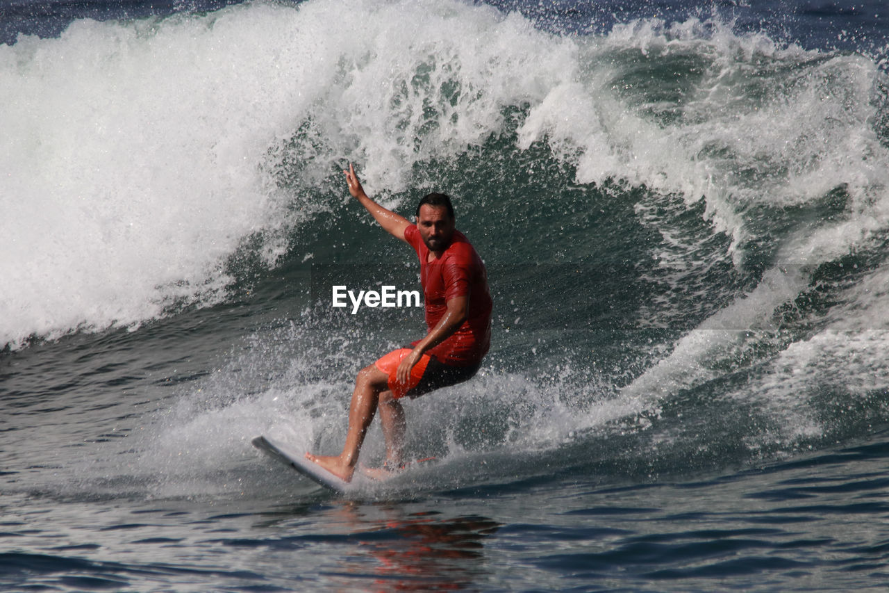 Man surfing in sea