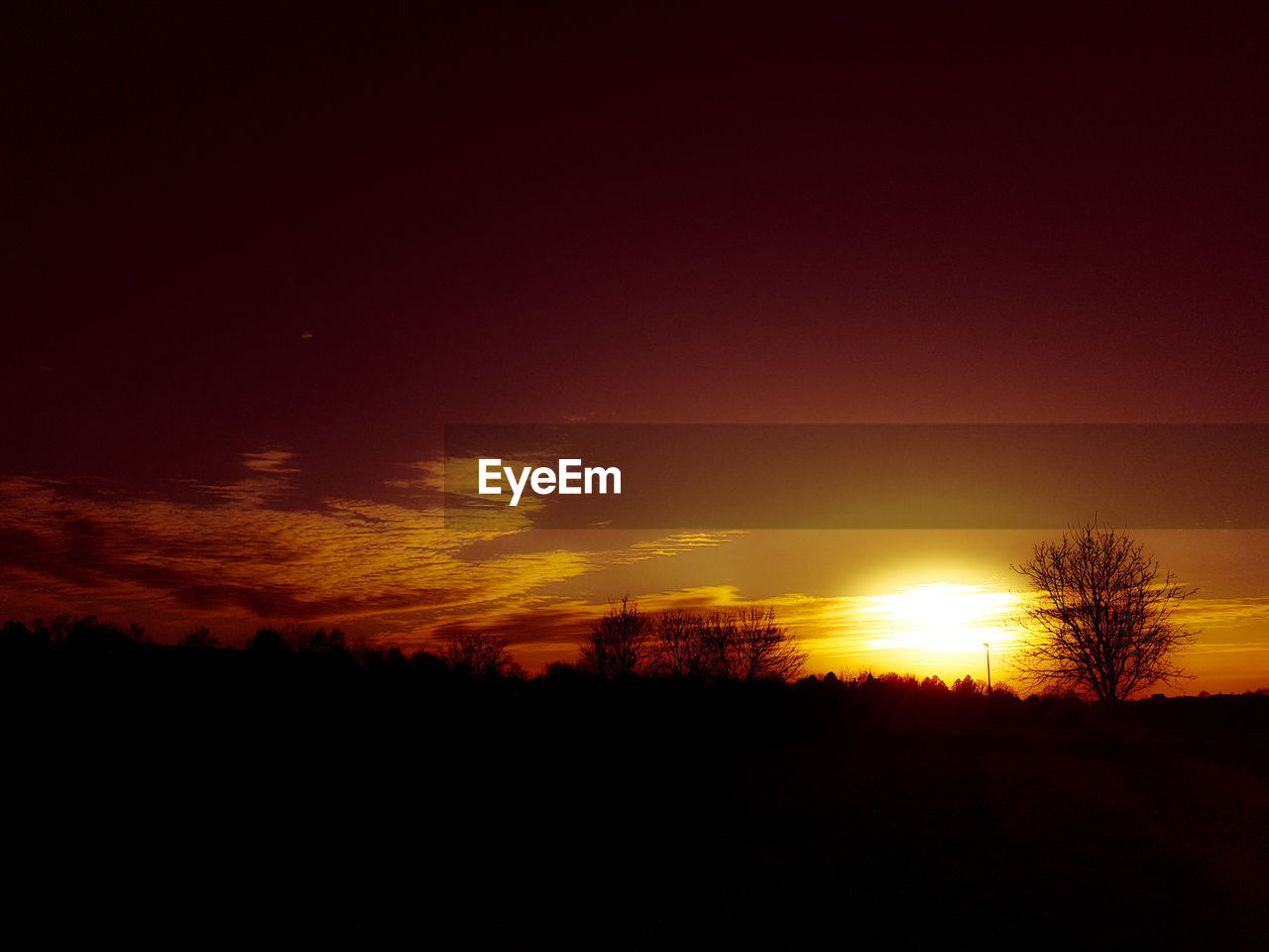 SCENIC VIEW OF SILHOUETTE LANDSCAPE AGAINST SKY DURING SUNSET