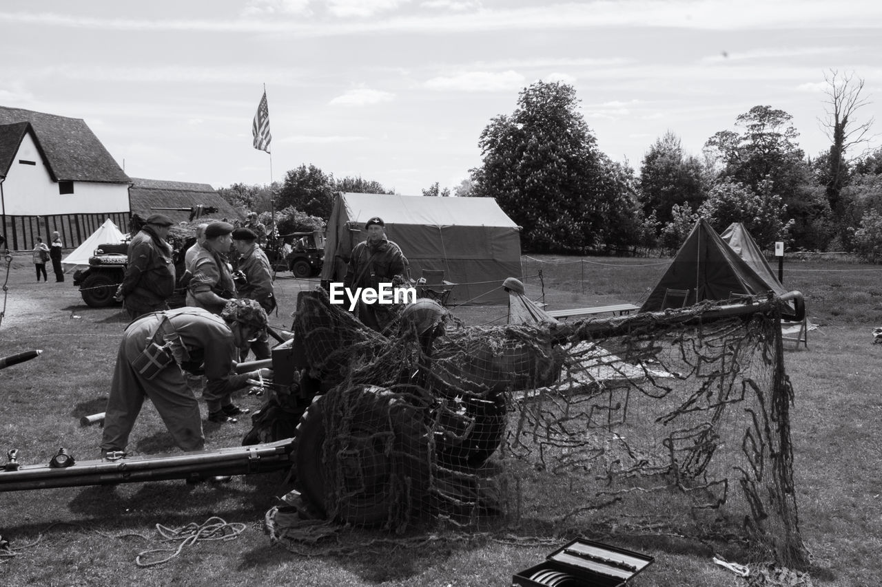 PANORAMIC VIEW OF PEOPLE ON BUILT STRUCTURE