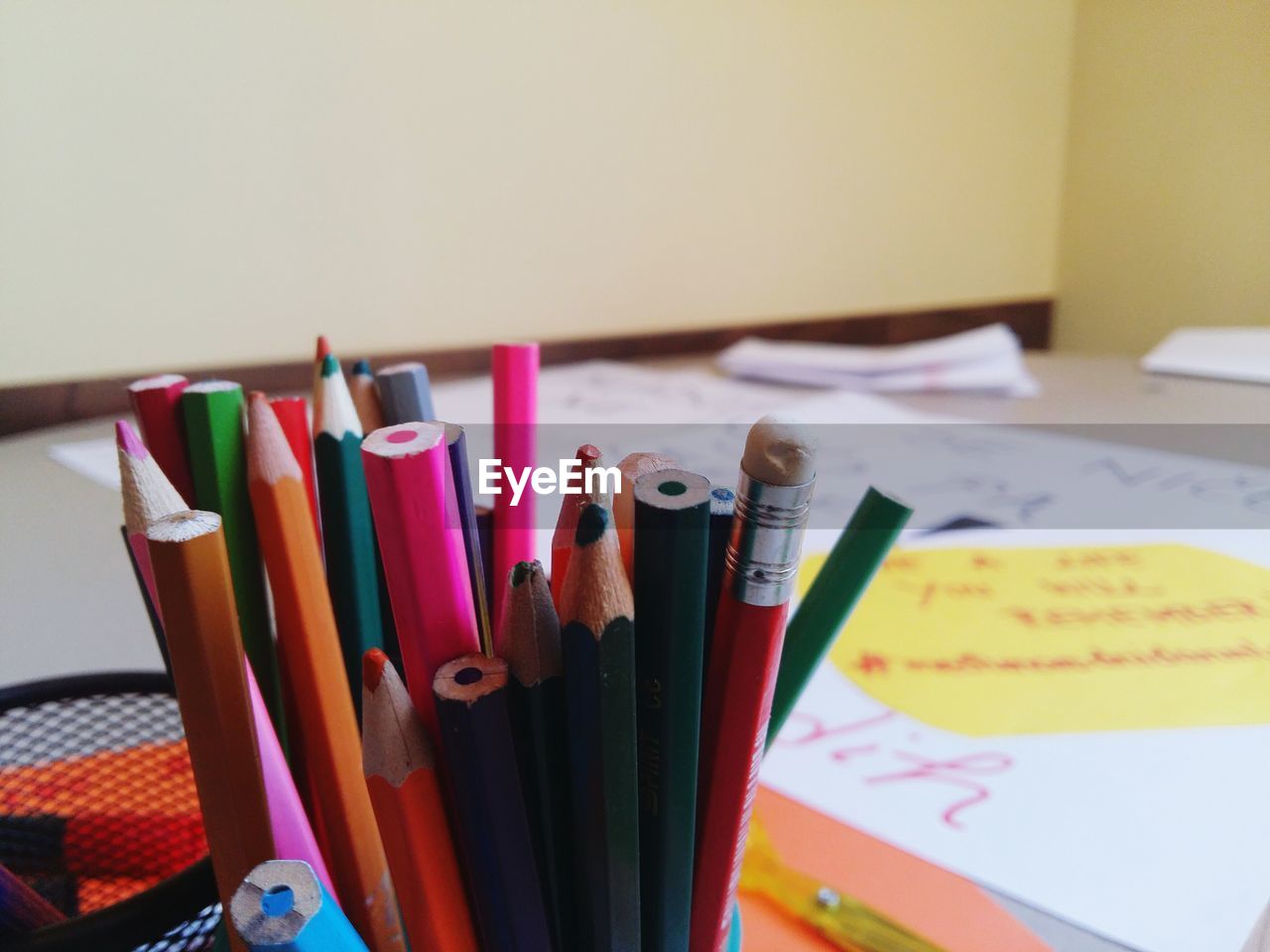 Close-up of colored pencils on table