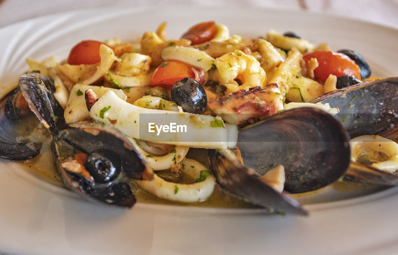 food, food and drink, healthy eating, dish, vegetable, wellbeing, seafood, freshness, plate, cuisine, mussel, fruit, meal, no people, italian food, close-up, animal, indoors, olive, produce, crustacean, herb