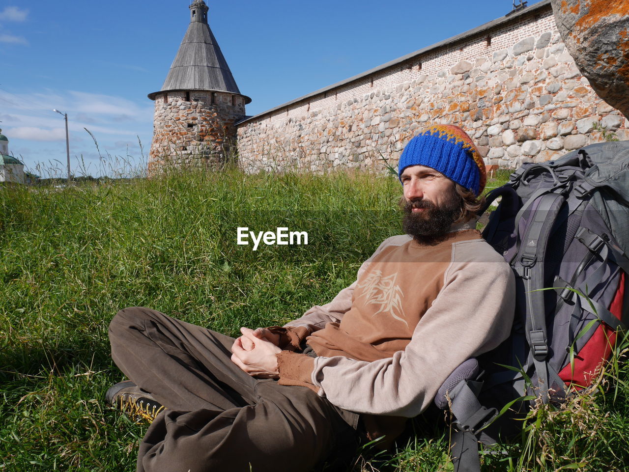 Church Monastery Ancient Architecture Tower Portrait Man Beard Beard Man Travelling Day Grass Relax Rest Solovki Solovetskie Ostrova Sit Wood Wall Christianity Christian Religion Hike Hiker Bagpack