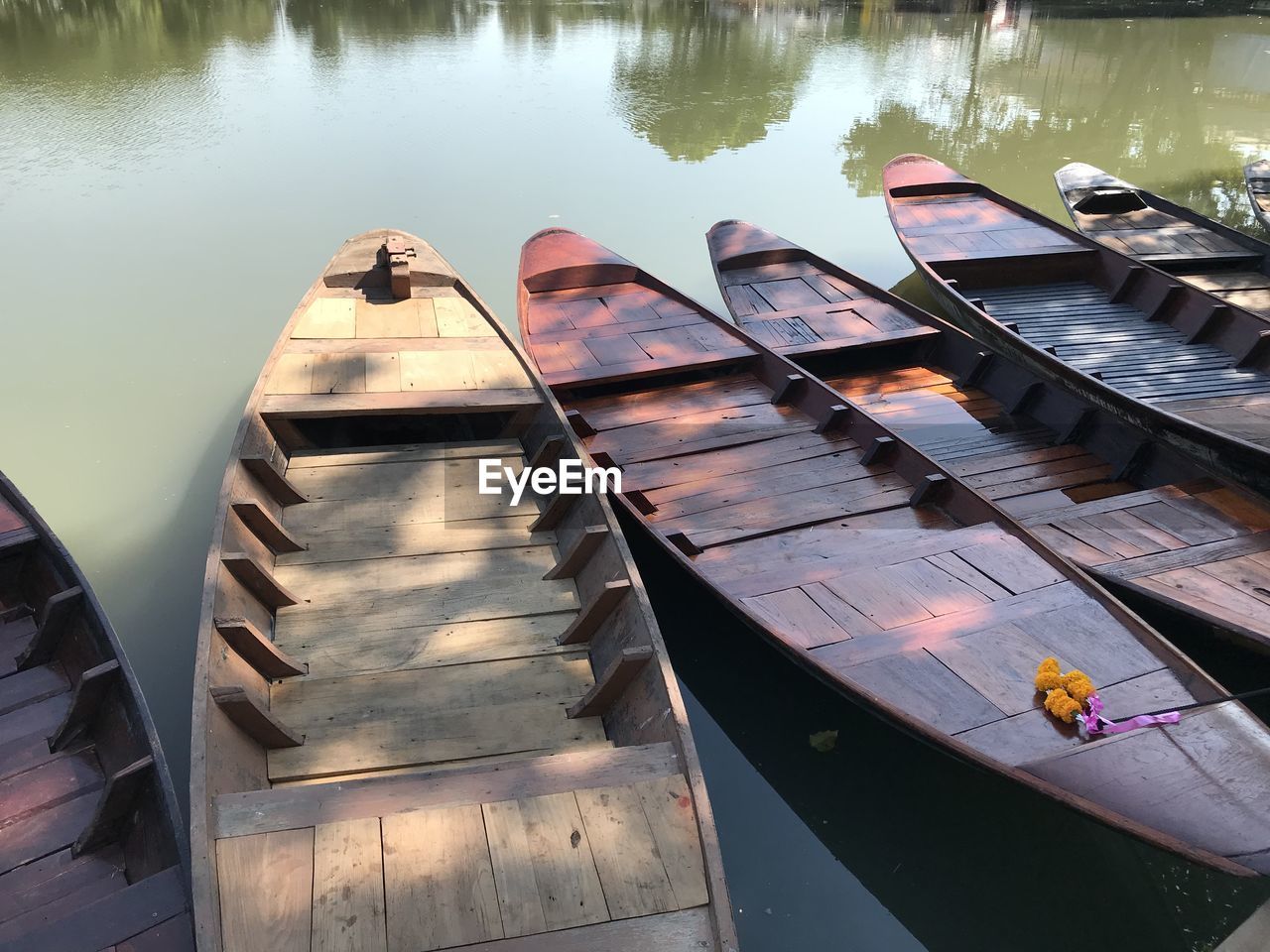 HIGH ANGLE VIEW OF NAUTICAL VESSEL IN LAKE