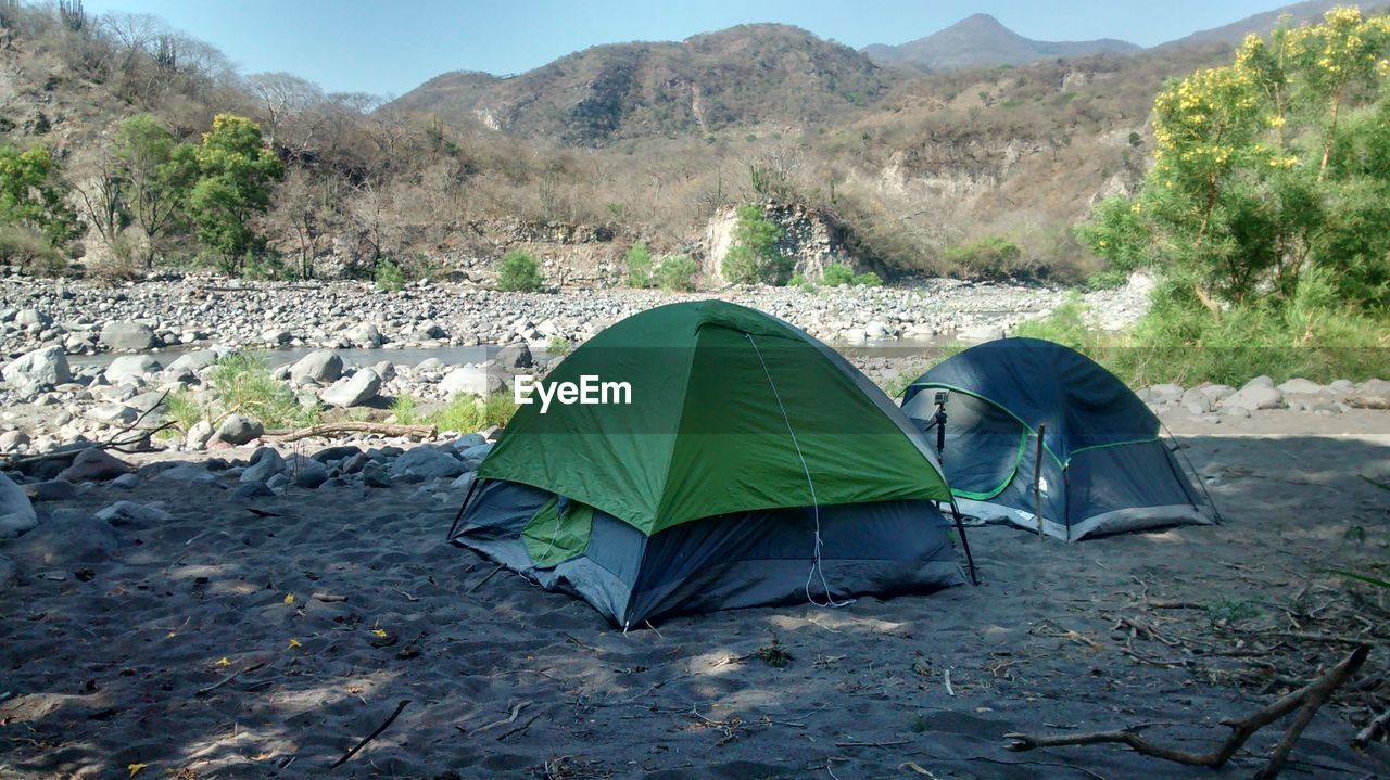 Camping tents on shore