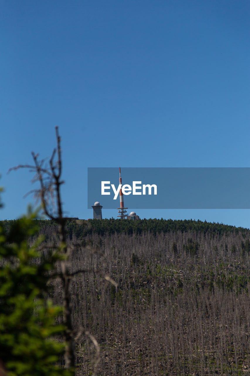 Low angle view of lighthouse against clear sky