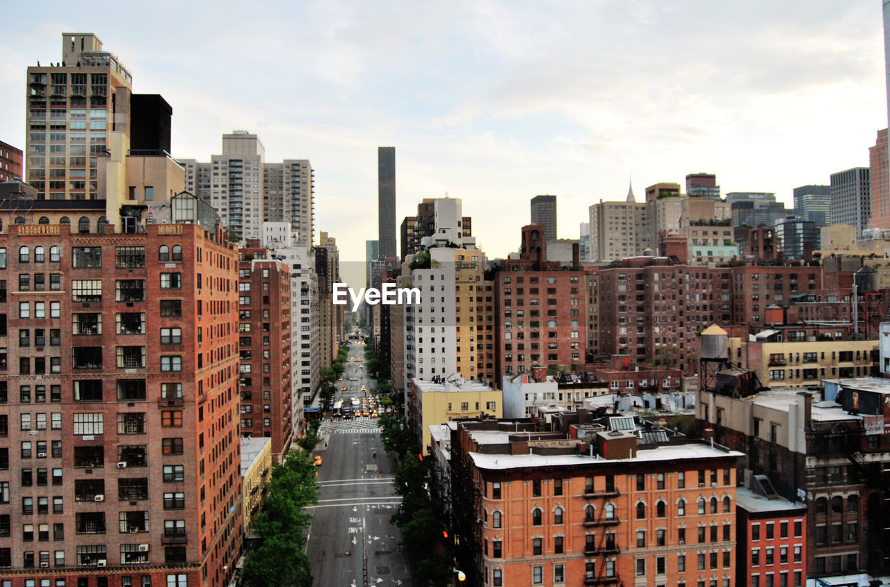 Buildings in city against sky