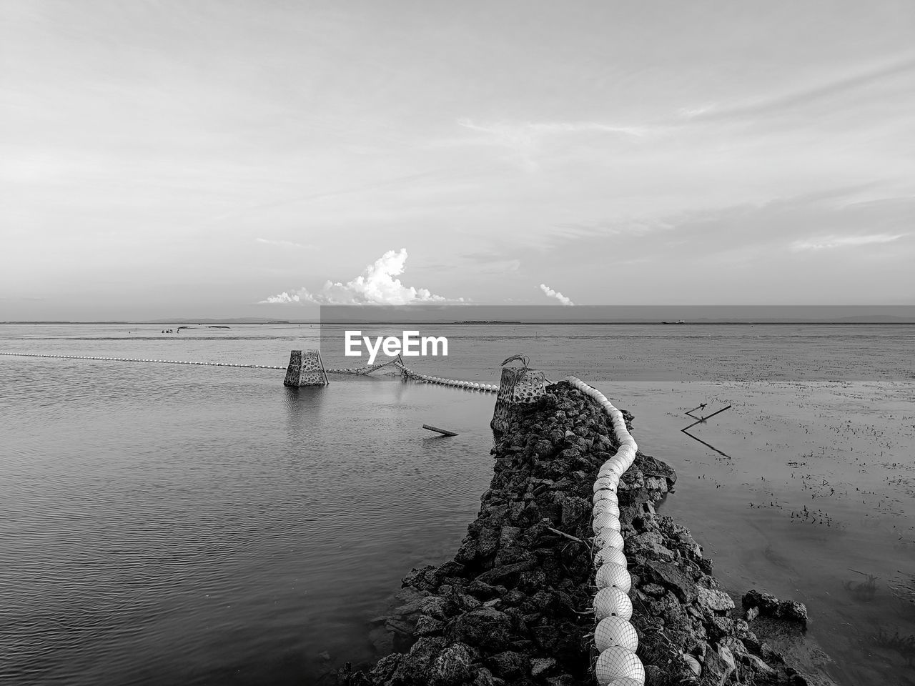 water, sea, sky, black and white, scenics - nature, horizon, nature, land, beauty in nature, cloud, monochrome photography, ocean, beach, coast, monochrome, horizon over water, shore, white, tranquility, wave, rock, tranquil scene, environment, no people, travel destinations, reflection, outdoors, nautical vessel, tower, day, travel, non-urban scene, landscape, idyllic, black, seascape