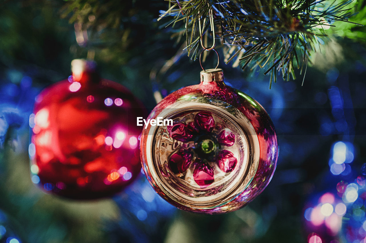 Retro christmas ball on christmas tree closeup, holiday home decoration