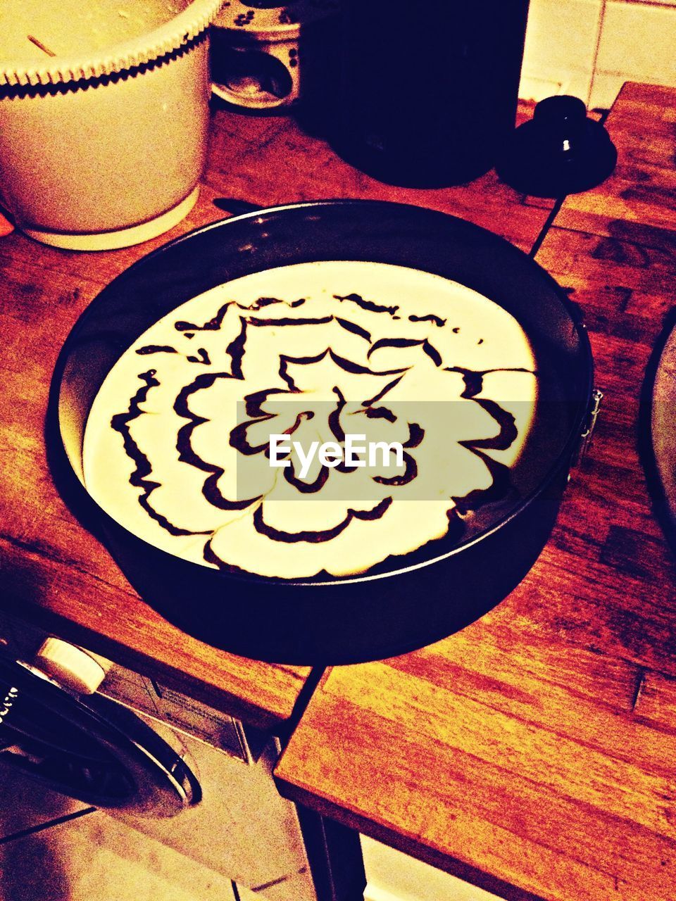 Close-up of cheesecake on wooden table