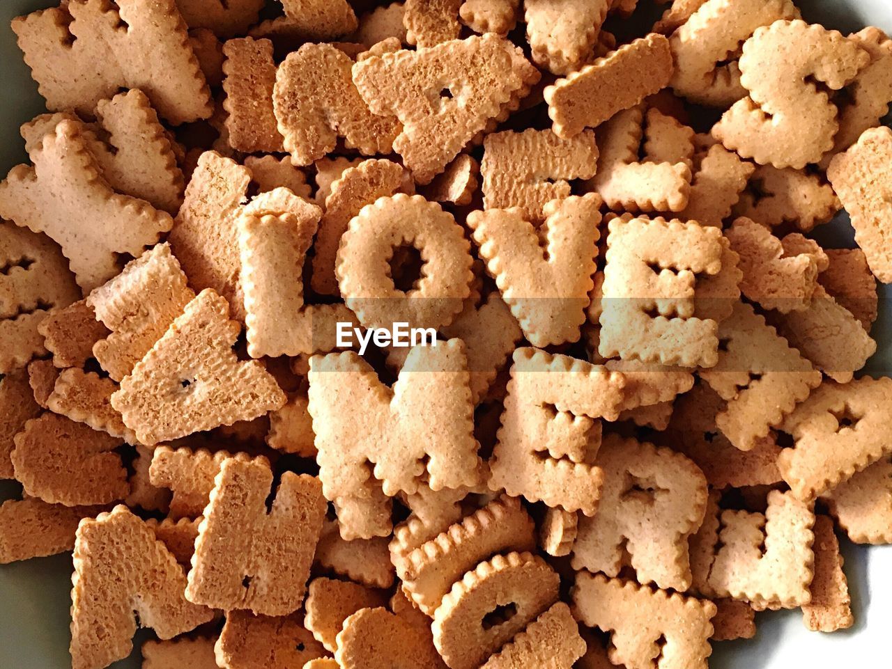 Directly above view of alphabets cookies