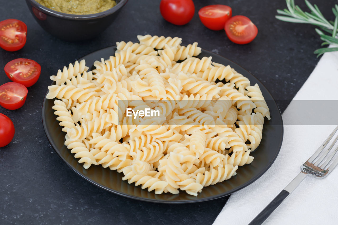 High angle view of pasta in plate on table