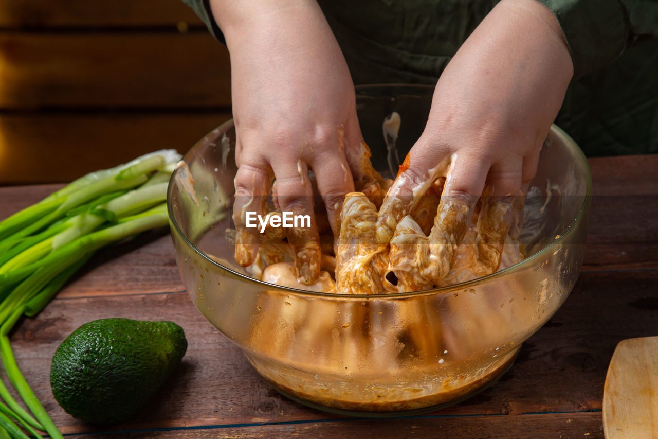 cropped image of man preparing food