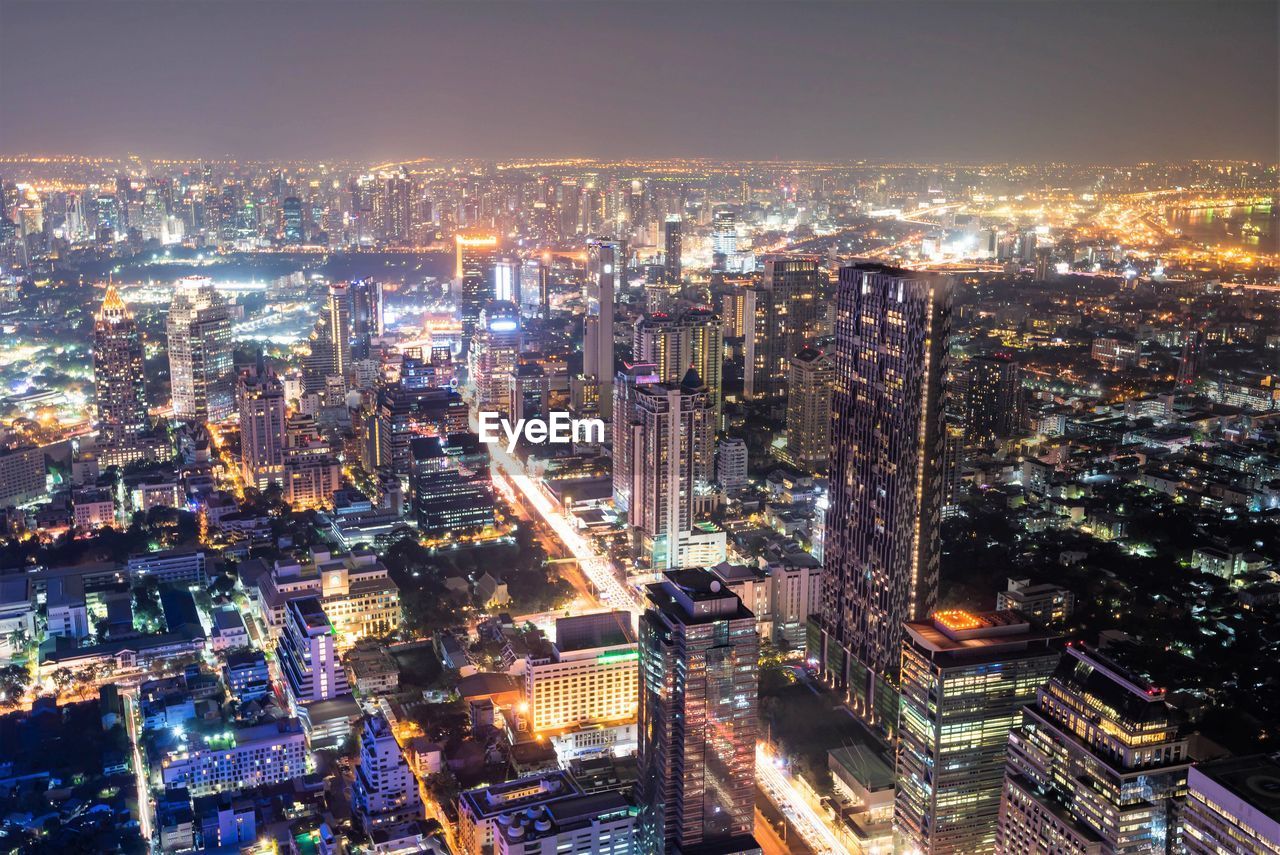 Night view of bangkok city lights from atop the mahanakhon building in bangkok