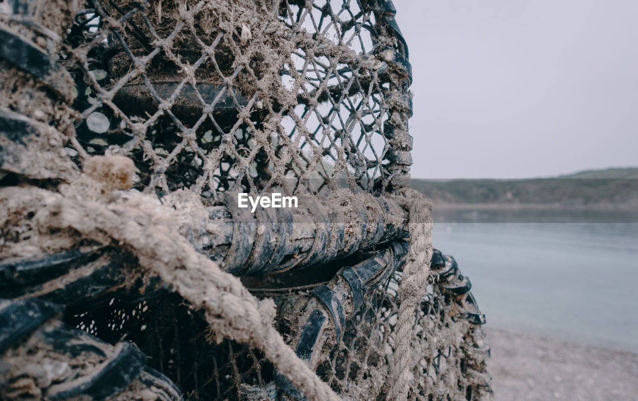 Fishing basket crates on shore