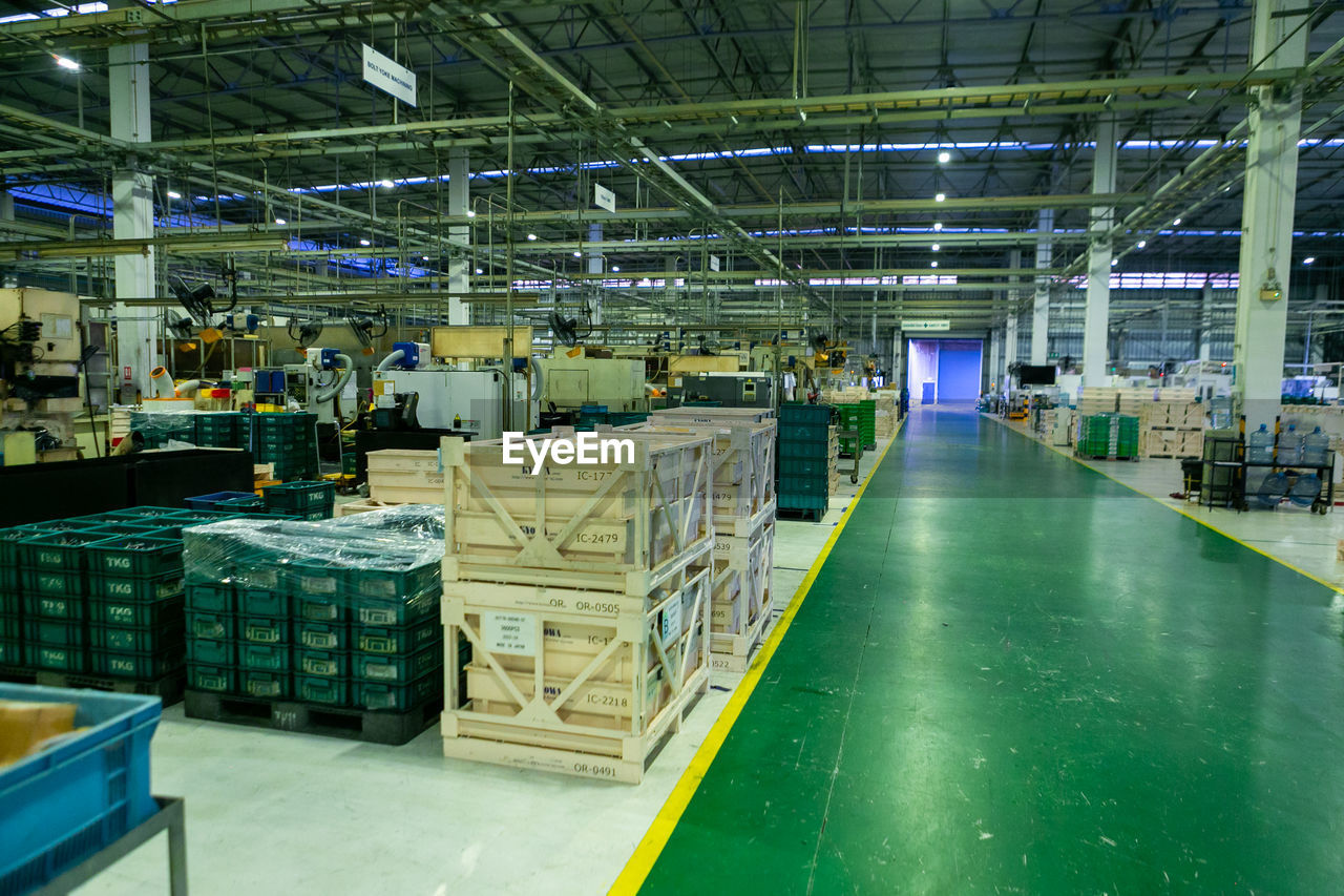 indoors, factory, industry, warehouse, domestic room, business, architecture, distribution warehouse, technology, equipment, industrial building, box, building, manufacturing, manufacturing equipment, container, no people, production line, built structure