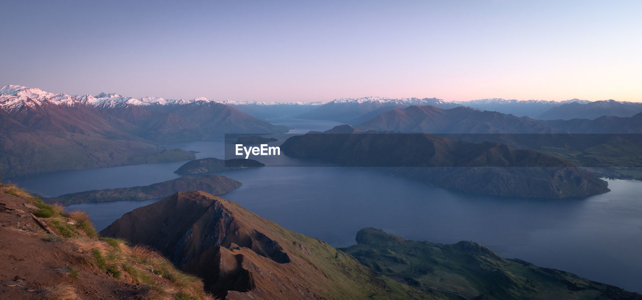 PANORAMIC VIEW OF MOUNTAINS AGAINST SKY