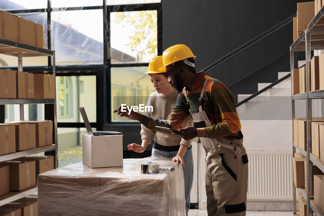 side view of man working in factory