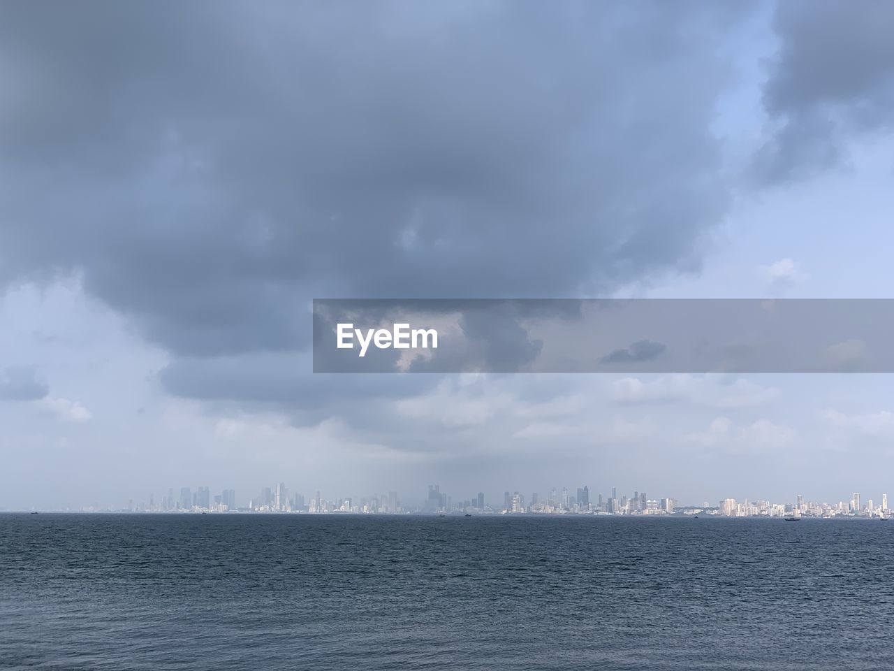cloud, sky, water, beauty in nature, reflection, nature, wave, ocean, horizon, no people, scenics - nature, sea, day, tranquility, tranquil scene, outdoors, snow, idyllic, sunlight, environment, cloudscape, wind wave, freezing