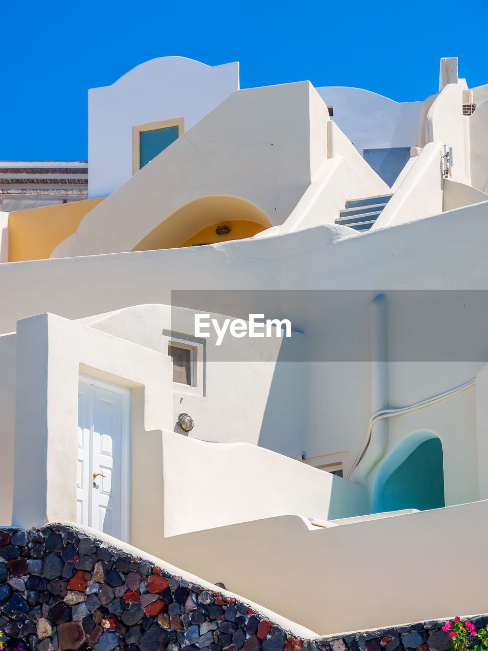 Amazing santorini view on white cave houses. santorini, cyclades, greece.