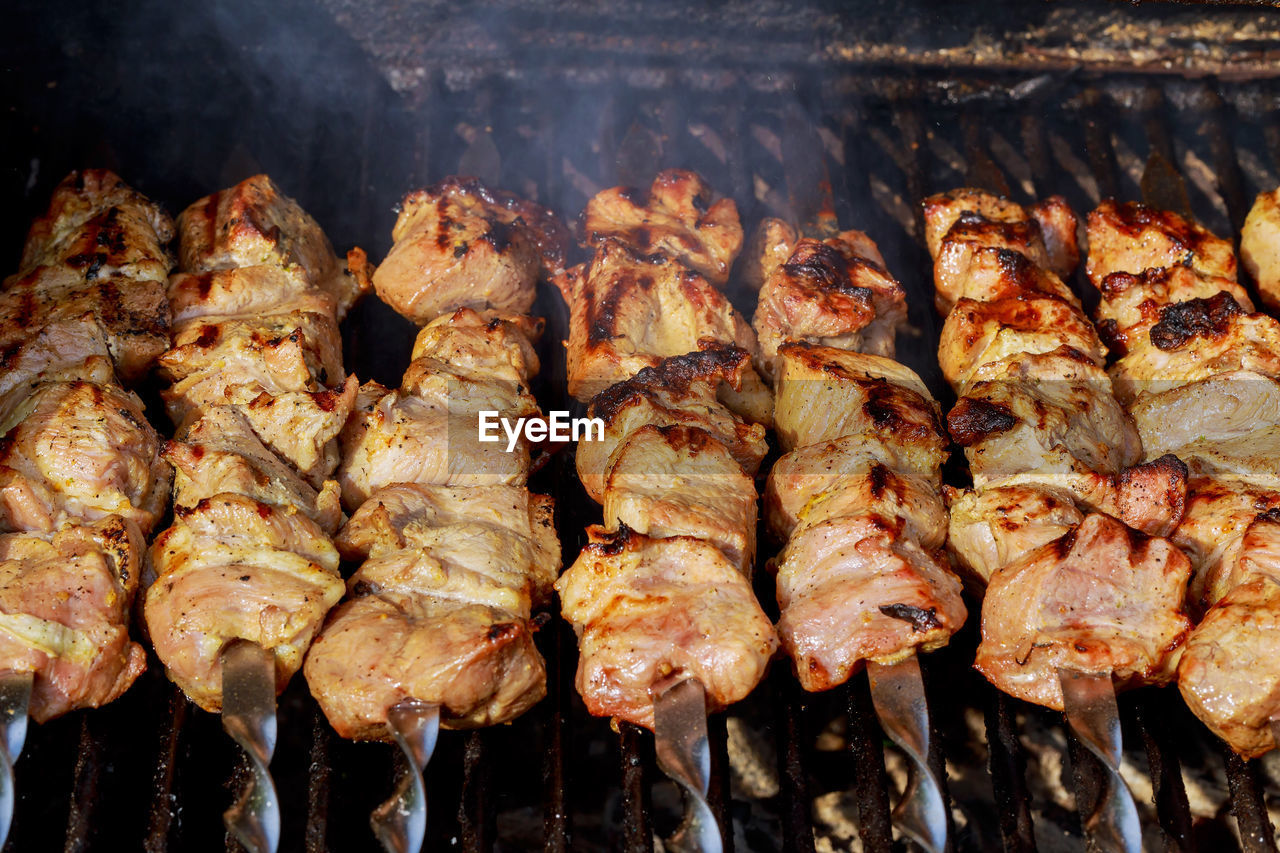 Close-up of meat on barbecue grill