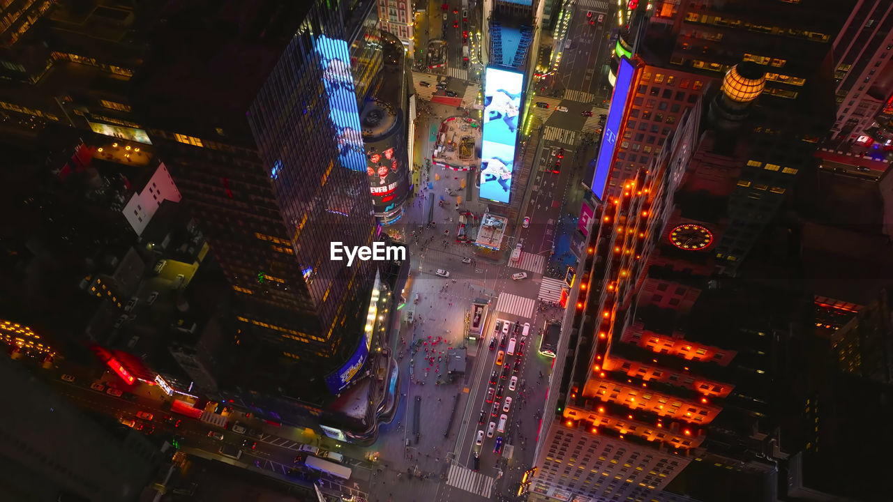 high angle view of illuminated buildings in city