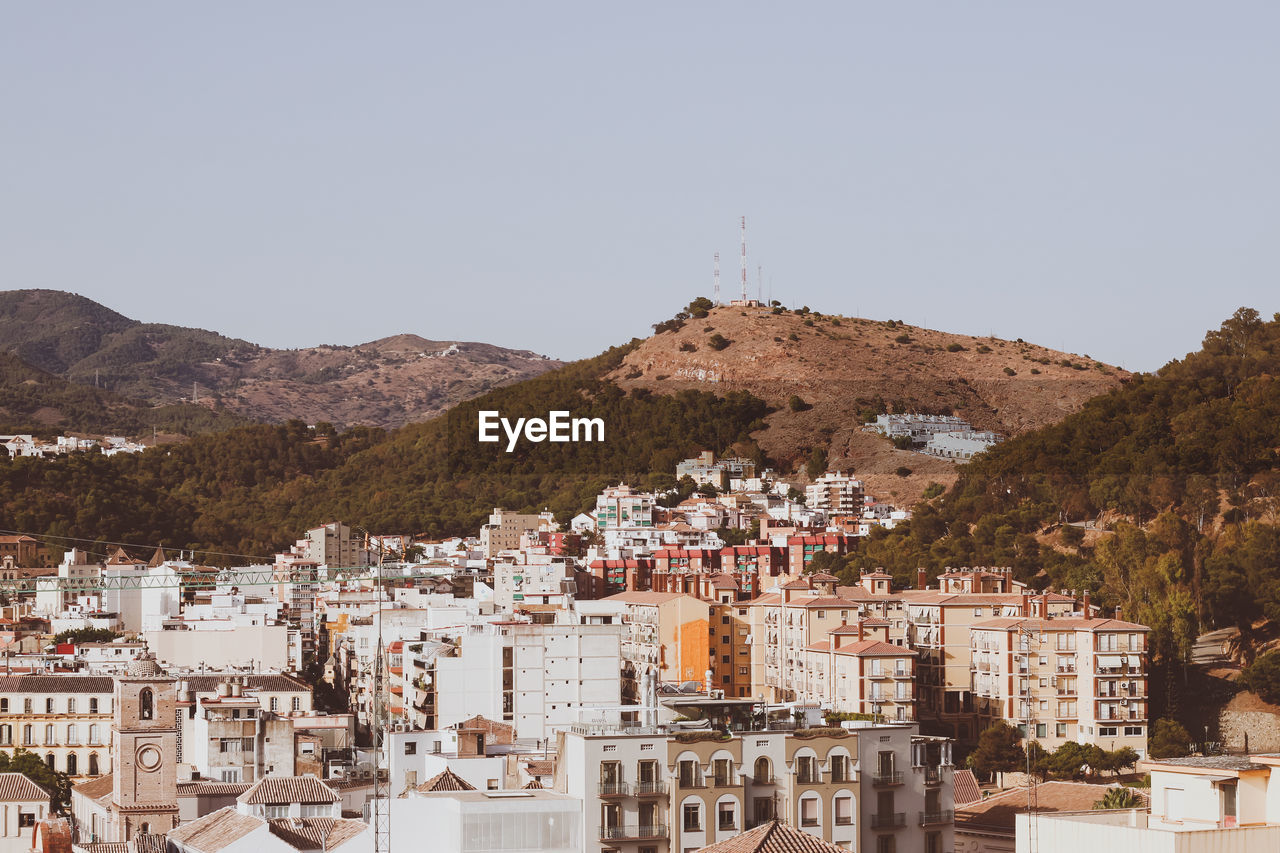 High angle shot of townscape against clear sky