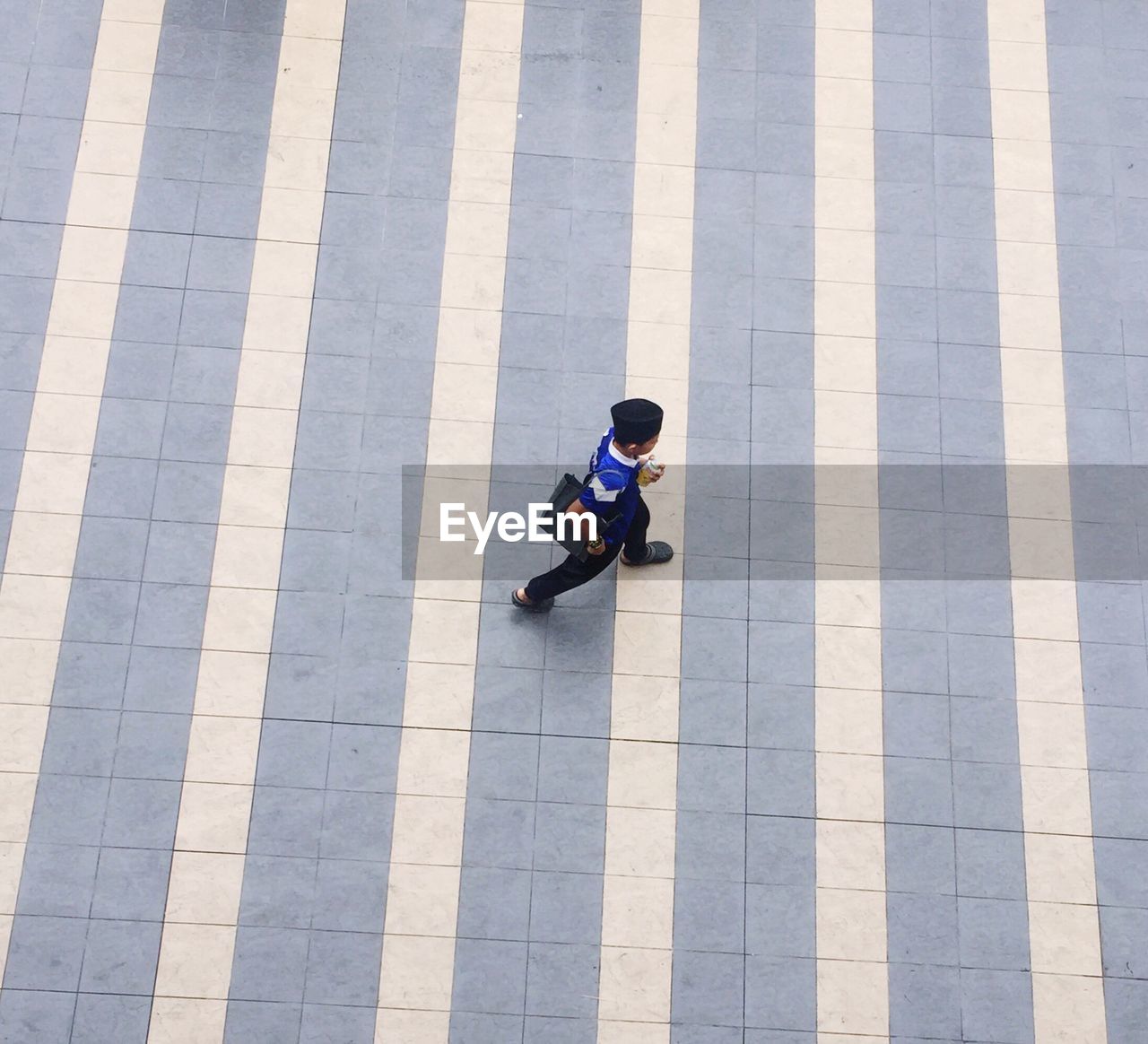 High angle view of boy walking