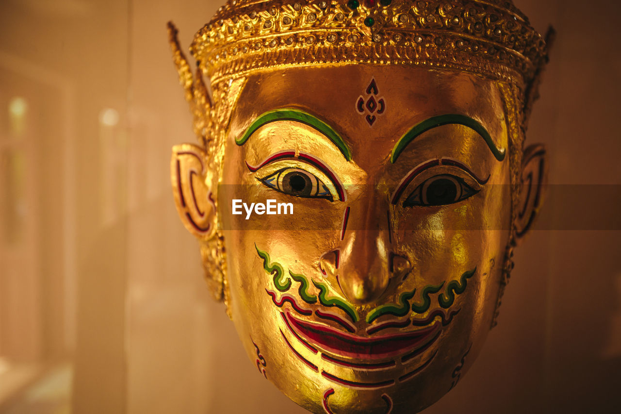 Close-up of golden mask