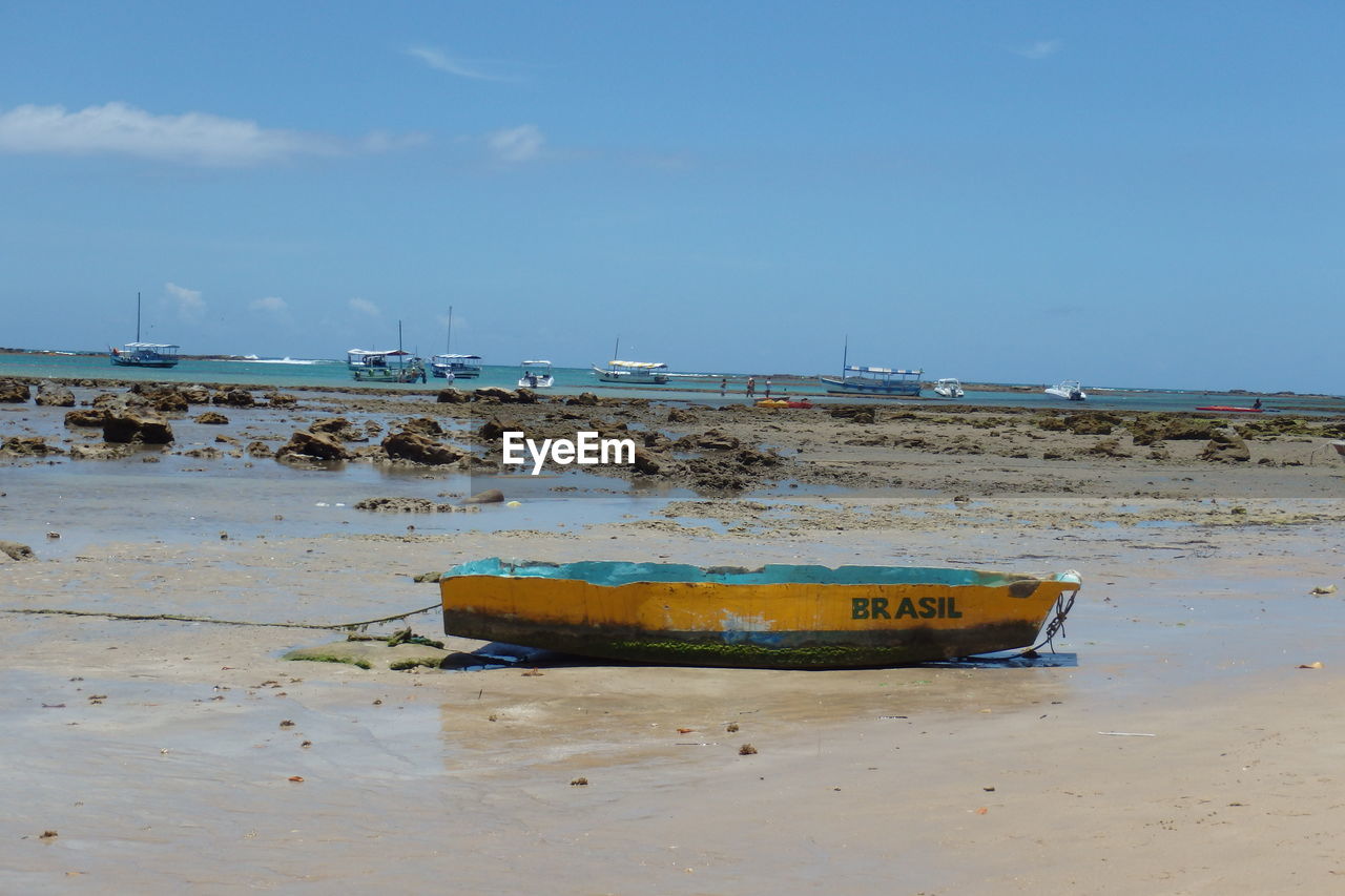 Scenic view boat on beach