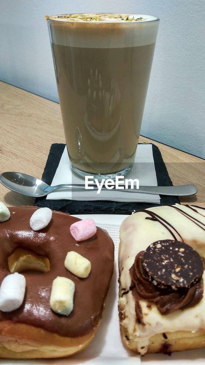 CLOSE-UP OF COFFEE WITH ICE CREAM