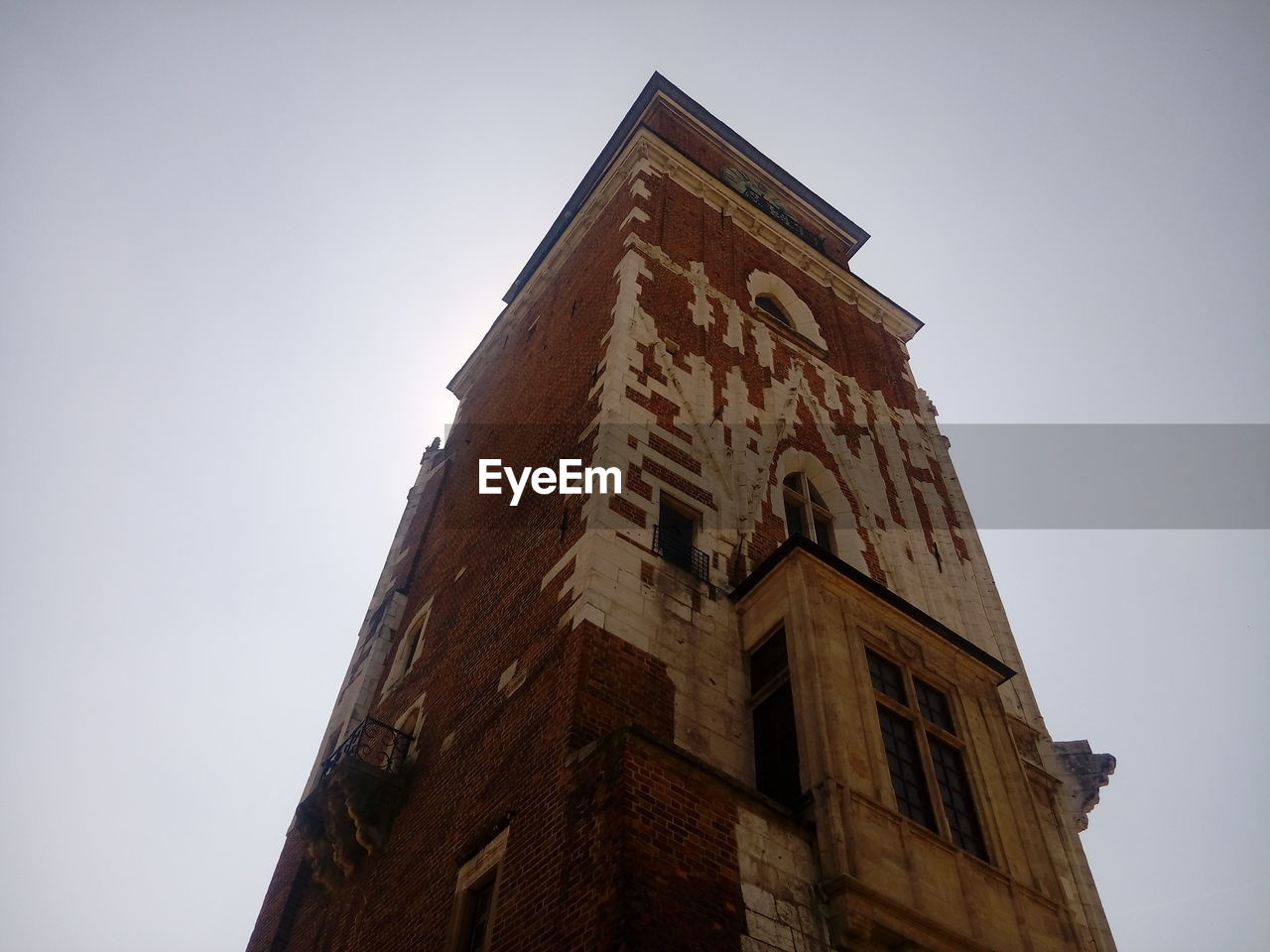 LOW ANGLE VIEW OF CLOCK TOWER