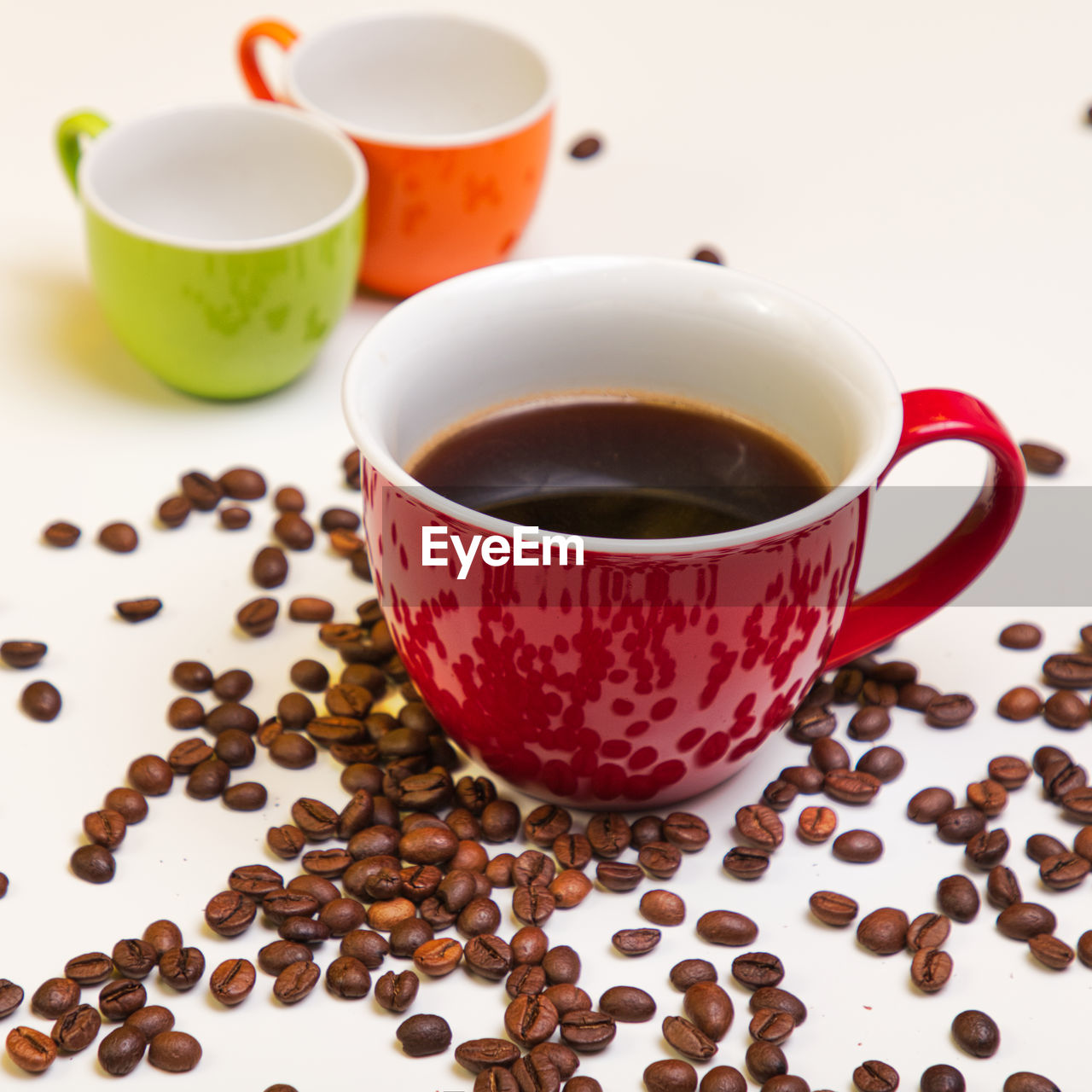 Enjoy your coffee - a close-up of coffee cup.