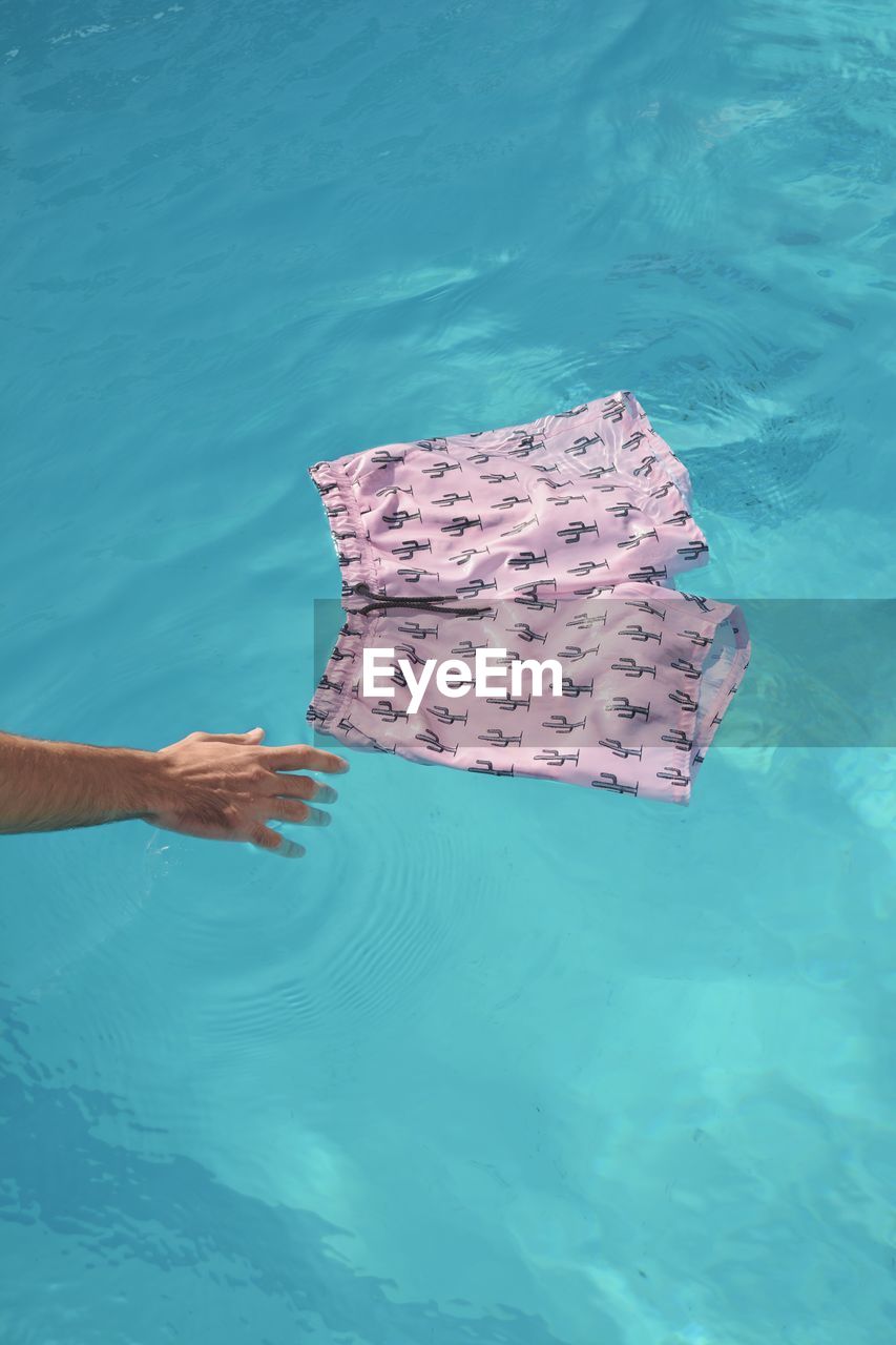 High angle view of swimming trunks in pool