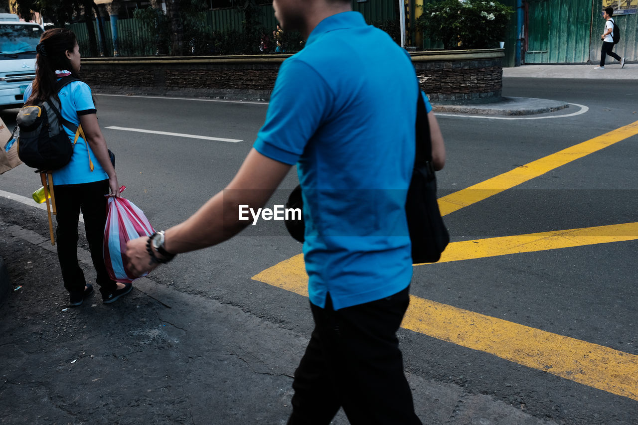 People on street in city