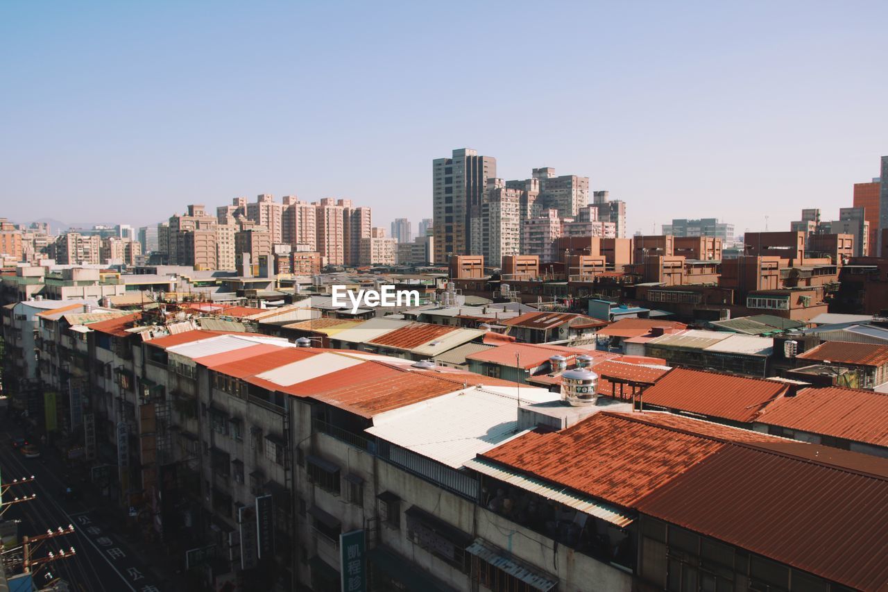 Cityscape against clear sky