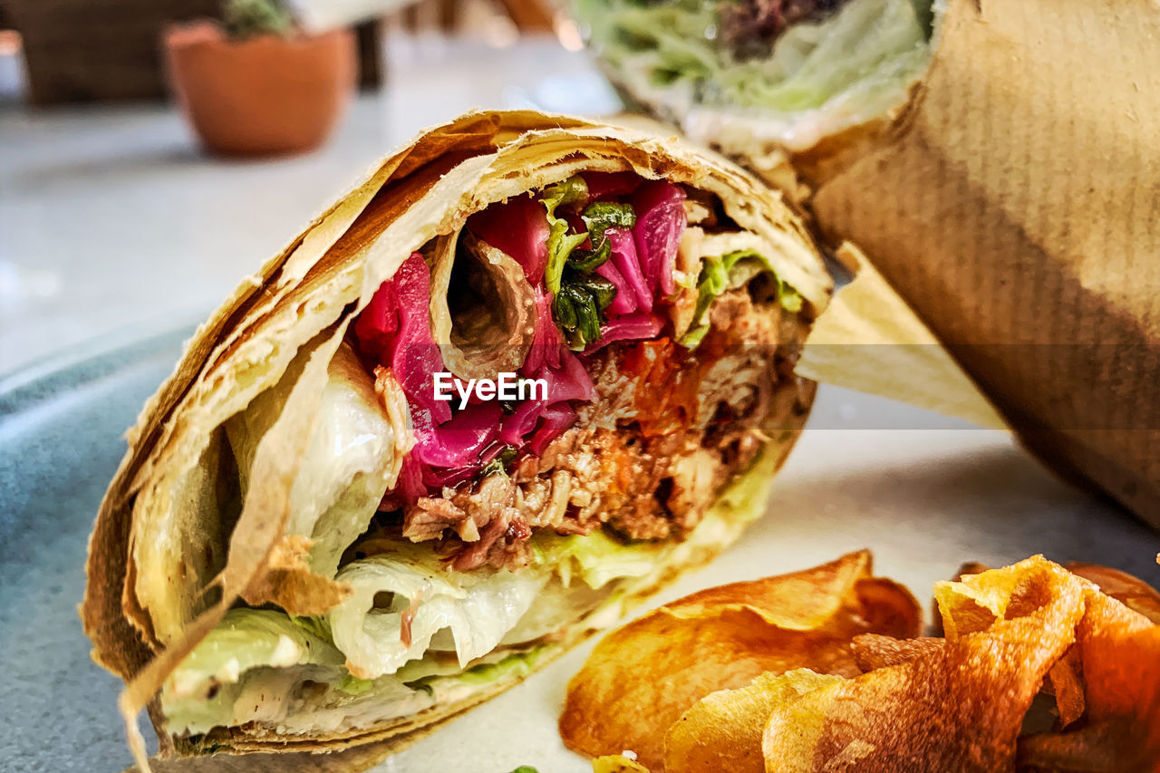 Close-up of food served on table