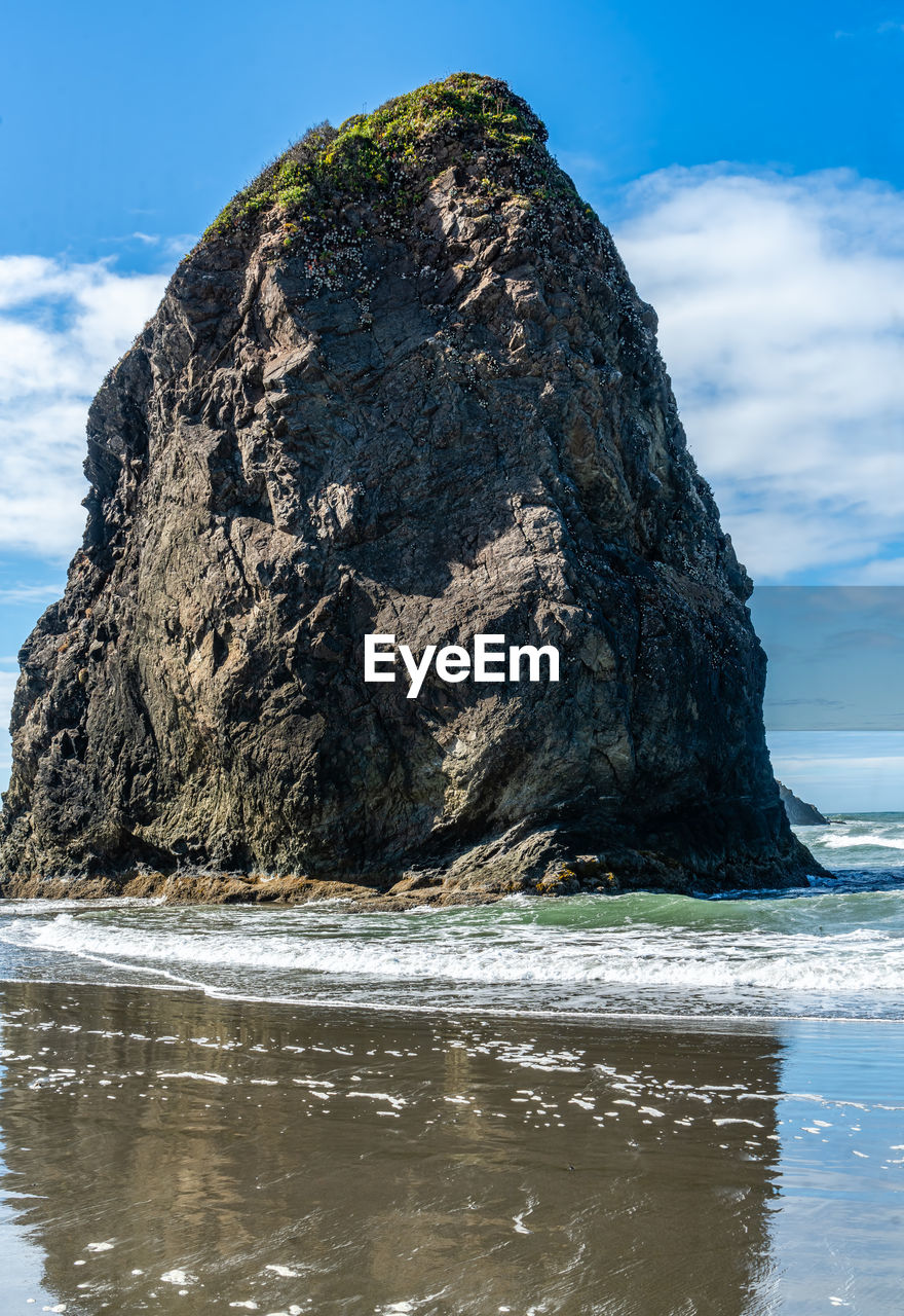 A view of a rock monolith at meyers creek beach in oregon state.