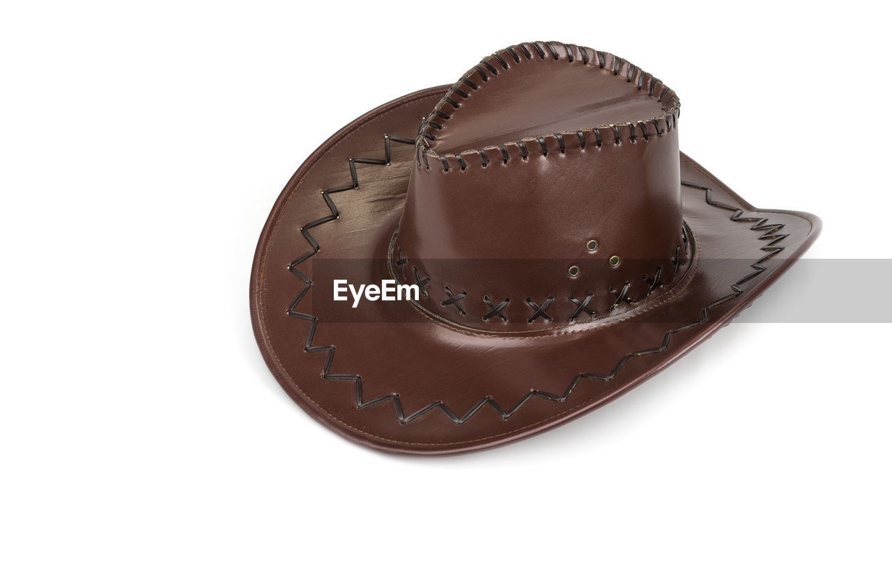 brown, cut out, white background, hat, cowboy hat, clothing, fashion accessory, footwear, chocolate, no people, studio shot, dessert, birthday cake, fedora, indoors