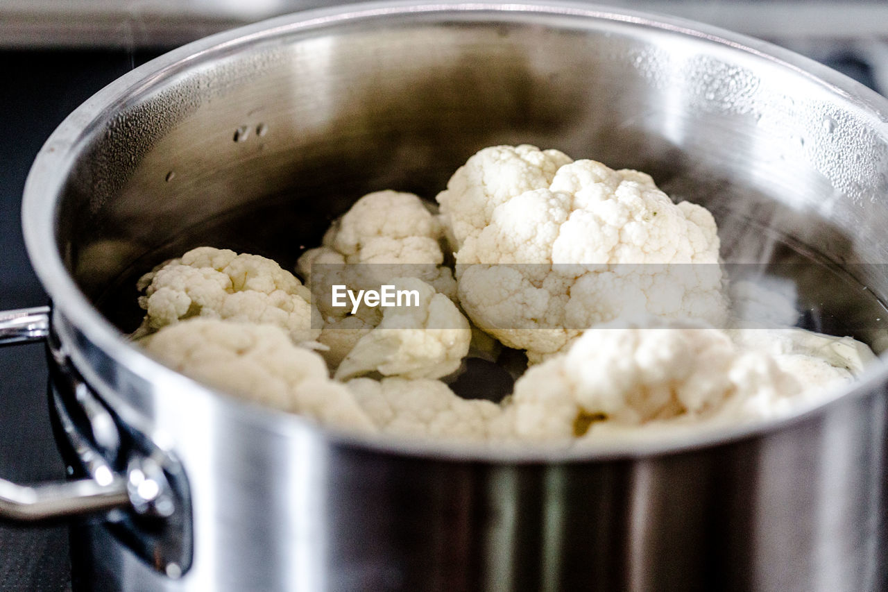 Close-up of cauliflower in cooking pan