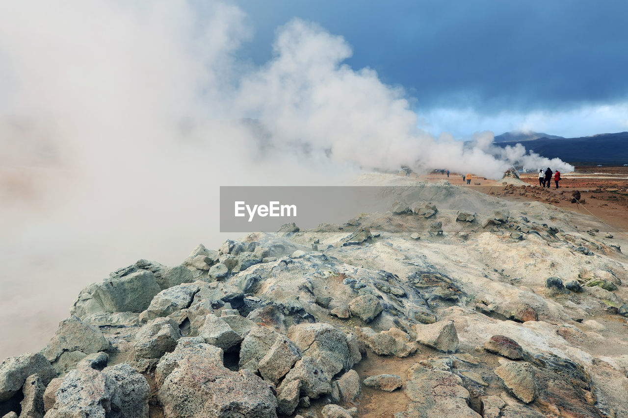 PANORAMIC VIEW OF ROCKS ON MOUNTAIN AGAINST SKY