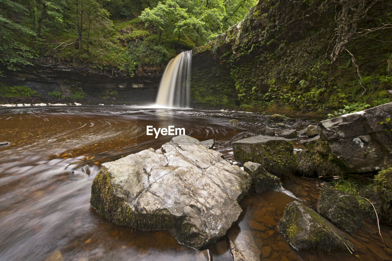 Sgwd gwladys waterfall in the brecon beacons in wales / uk
