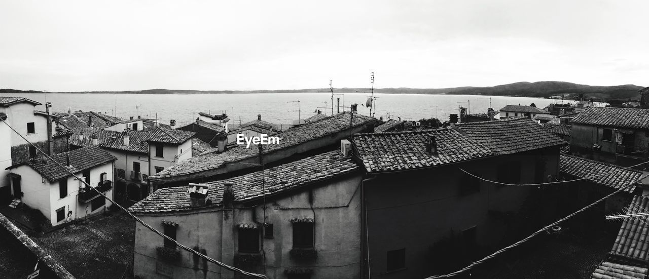 Panoramic view of houses by lake at trevignano romano