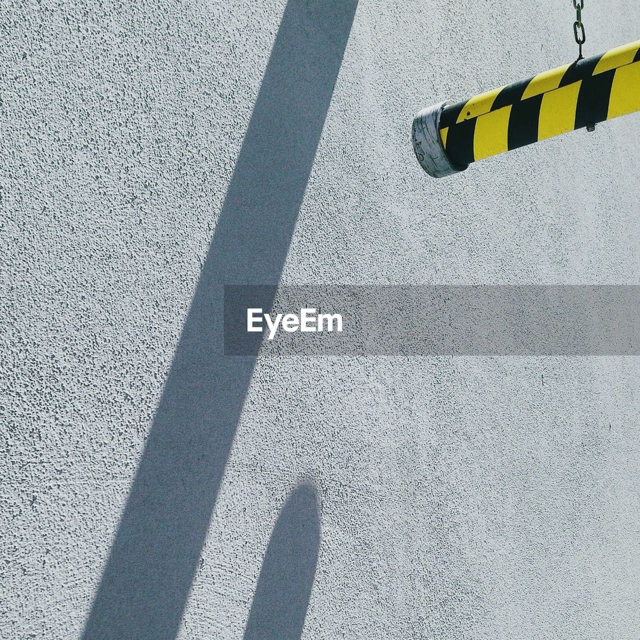 High angle view of bollard on street