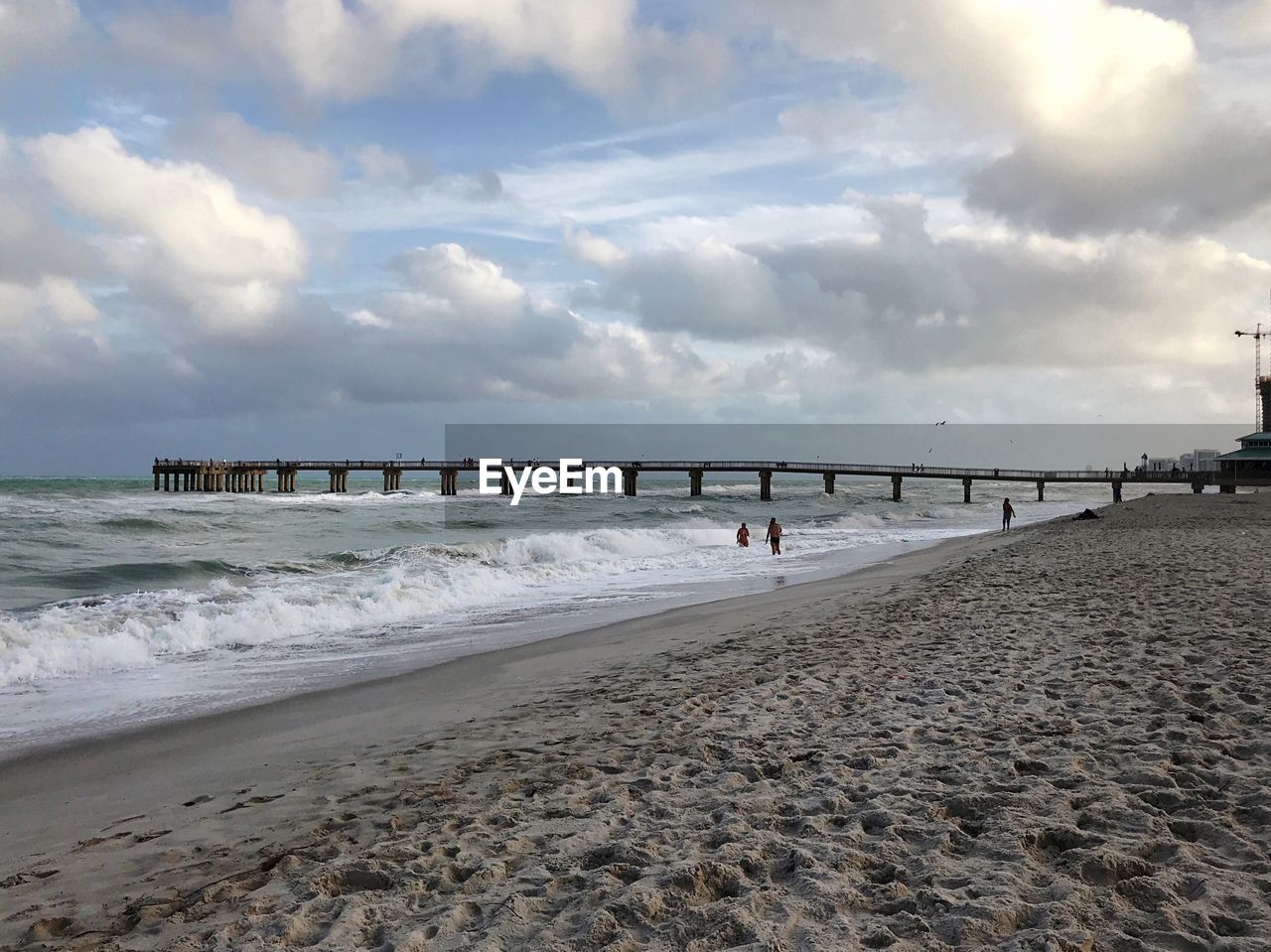 PIER ON SEA AGAINST SKY