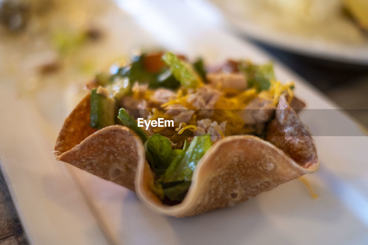 food and drink, food, fast food, dish, healthy eating, vegetable, meal, taco, freshness, no people, close-up, cuisine, produce, plate, wellbeing, indoors, selective focus, breakfast, mexican food, lunch, asian food, meat