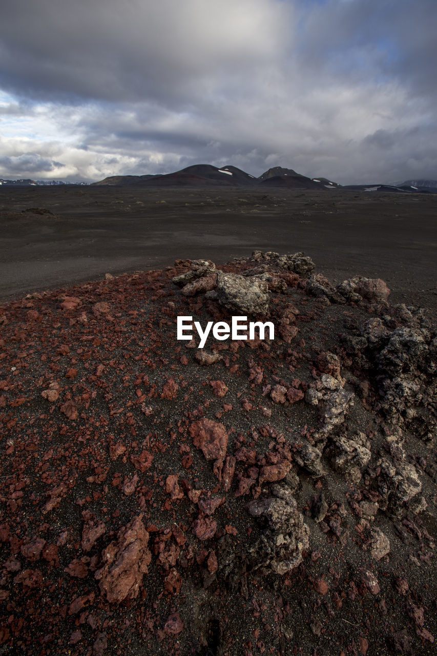 Aerial view of barren landscape against sky