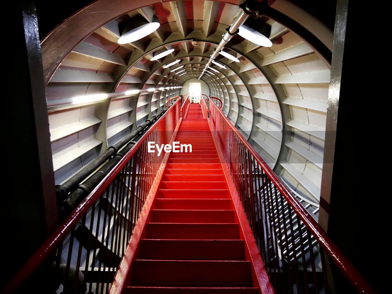 STAIRCASE IN MODERN CORRIDOR